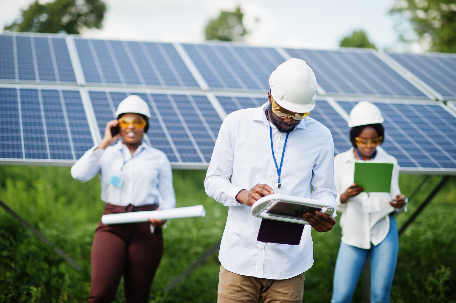 african american technician checks maintenance solar panels group three black engineers meeting solar station